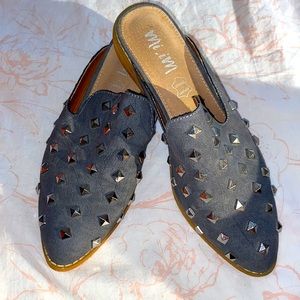 Gray mules that are super cute dressed up or down.